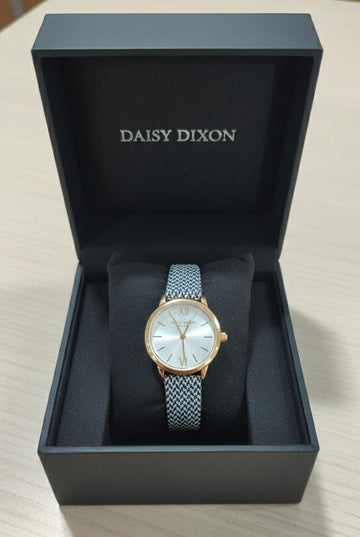 Daisy Dixon women's watch with a gold-tone case and a patterned fabric strap