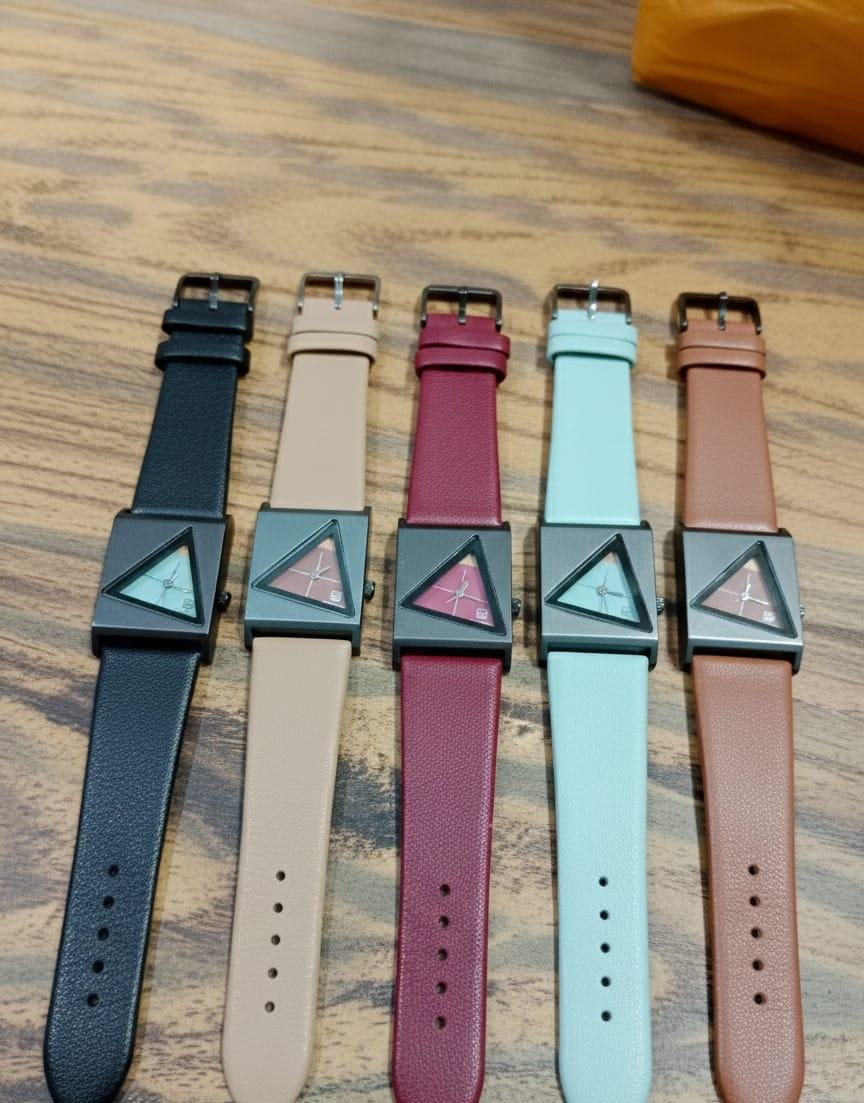 Rolf Cremer design watches with leather straps and a distinctive triangle DIAL